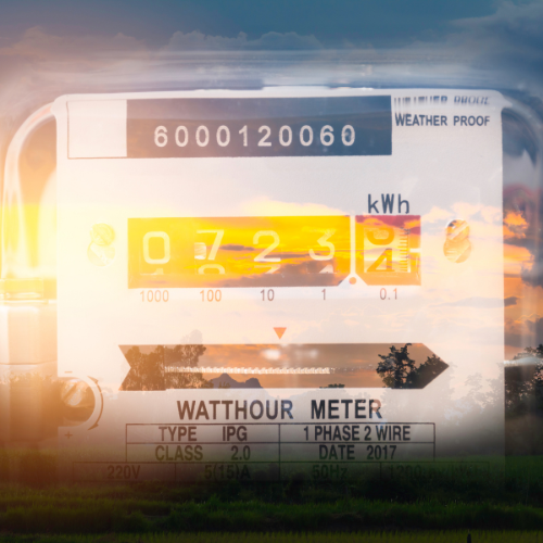 Close-up of a watthour meter overlayed with a scenic sunset and landscape, symbolizing energy consumption and environmental awareness.